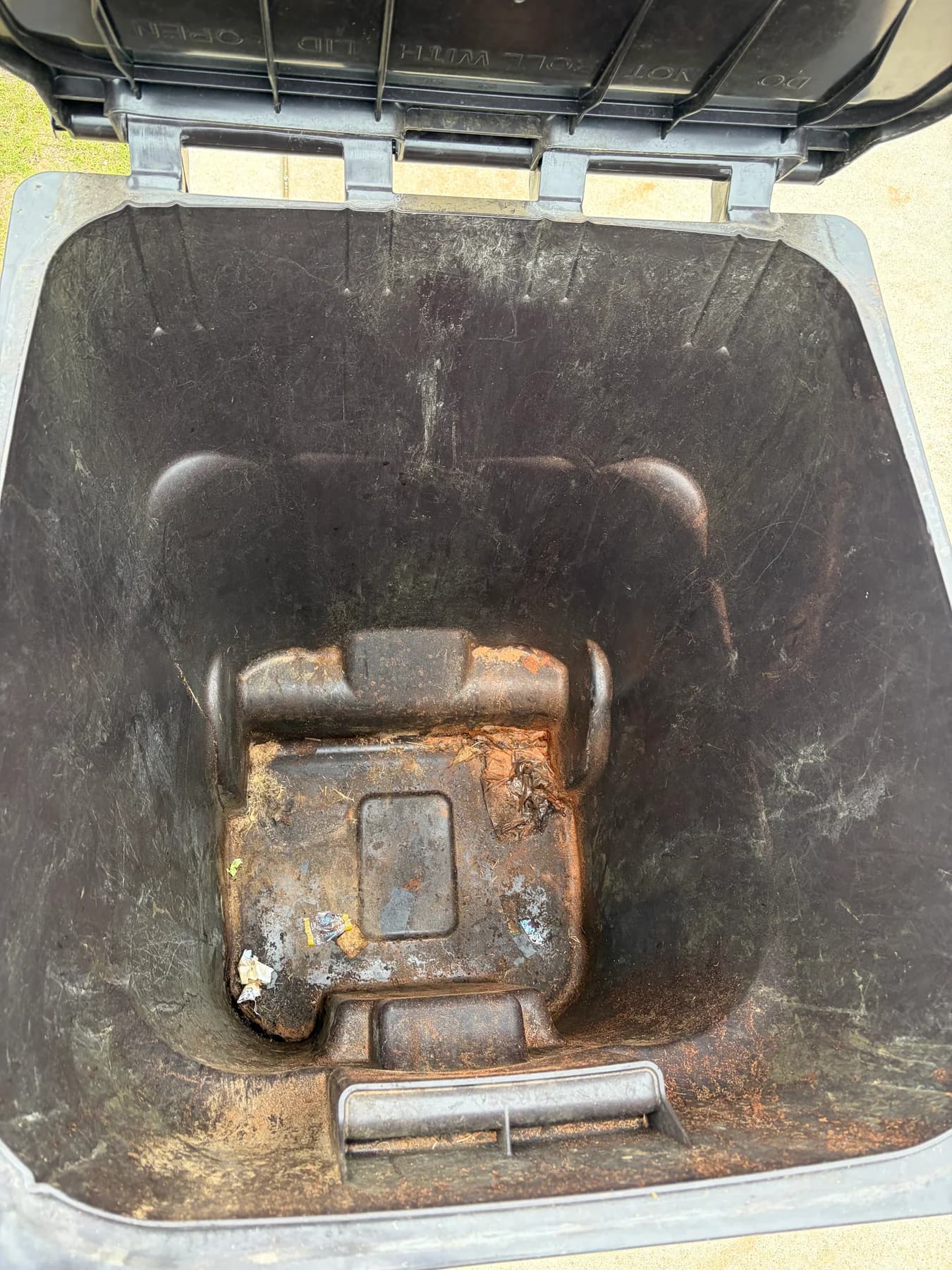 Brown residential bin before cleaning