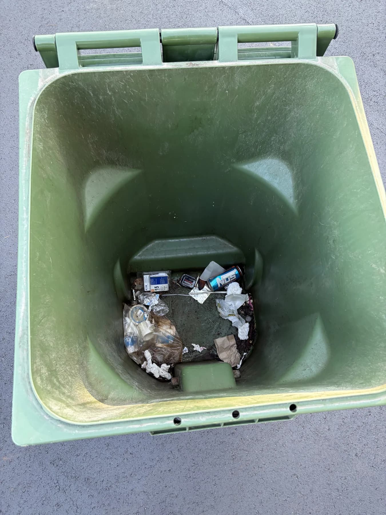 Green residential bin before cleaning